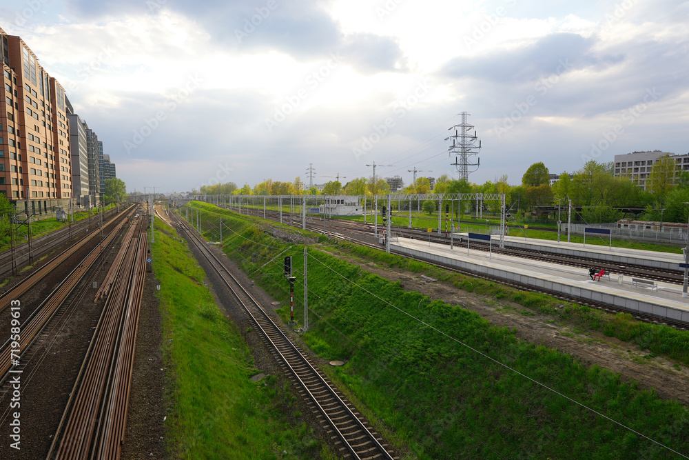 railroad tracks surrounded by grass railroad tracks surrounded by grass