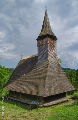 Abstract background image of weathered wooden tiles on the roof photo