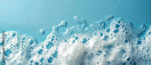 spot of thick shampoo foam on a blue background photo