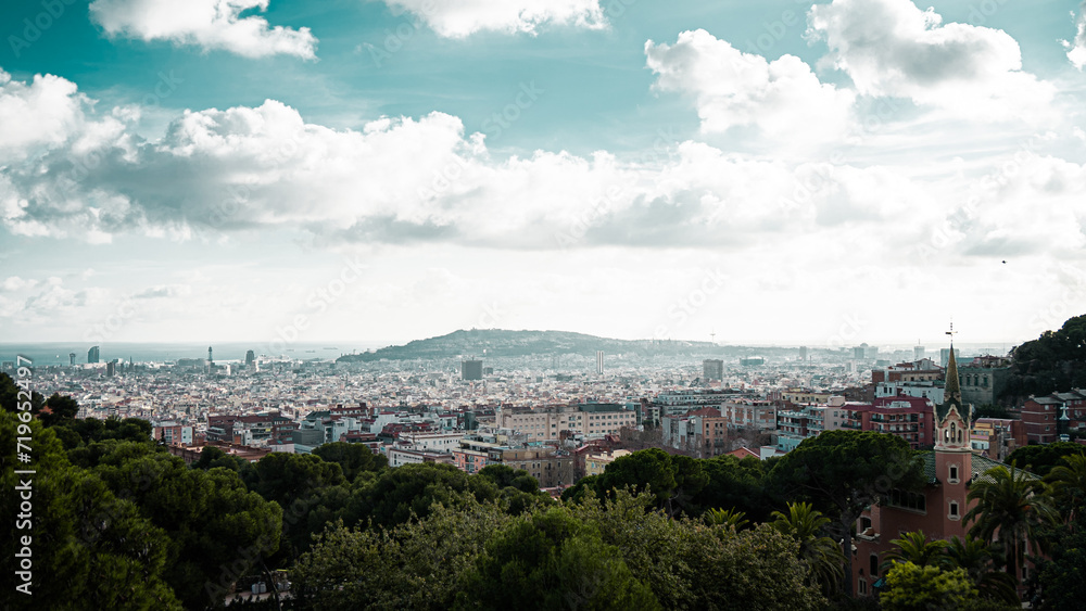 A Super wide Panoramic of Barcelona, Spain with a mountain in the distance