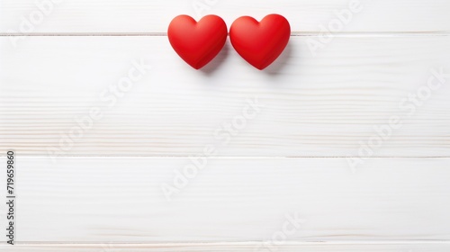 two red hearts on old rustic white wooden table top view. Valentine's day concept