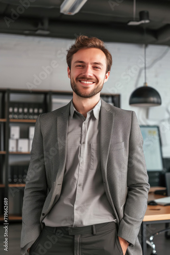 Professional Businessman in Suit Standing in Modern Office