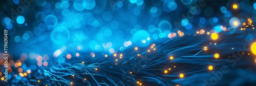 Network cables and optical fibers with lights in the ends. Blue background. 