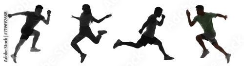 Silhouettes of sporty runni...