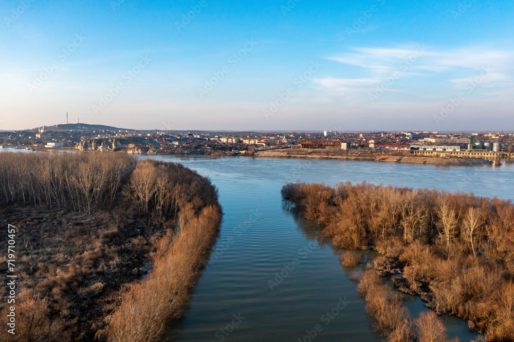 Danube Panorama: Aerial View of Forest with City in the Backdrop Danube Panorama: Aerial View of Forest with City in the Backdrop