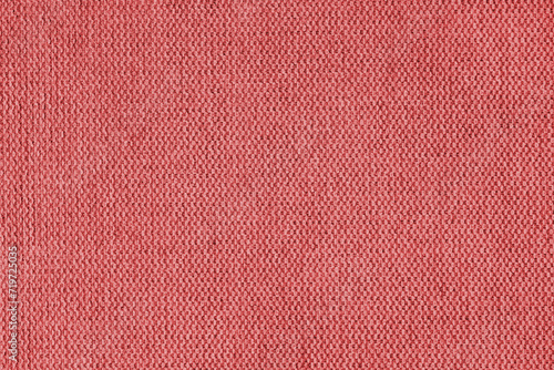 Textile background, red coarse fabric texture, cloth structure close up, jacquard woven upholstery, furniture textile material, wallpaper, backdrop..