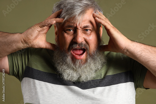 Afraid mature man screaming...