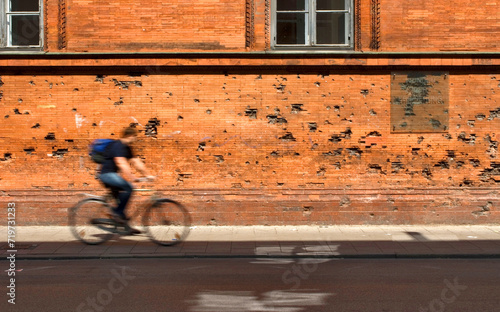 Brick wall with bullet holes from the Second World War and an information board Wounds of Remembrance, memorial site, Schellingstraße, Munich, Bavaria, Germany, Europe photo