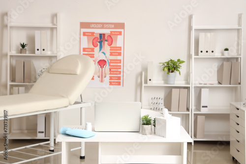 Interior of medical office with workplace  couch and shelf units