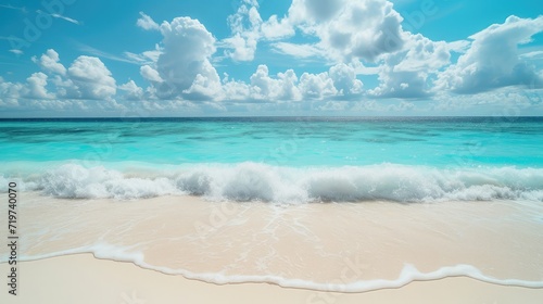Panorama of a beautiful white sand beach and turquoise water in Maldives. Holiday summer beach background.. Wave of the sea on the sand beach. © buraratn