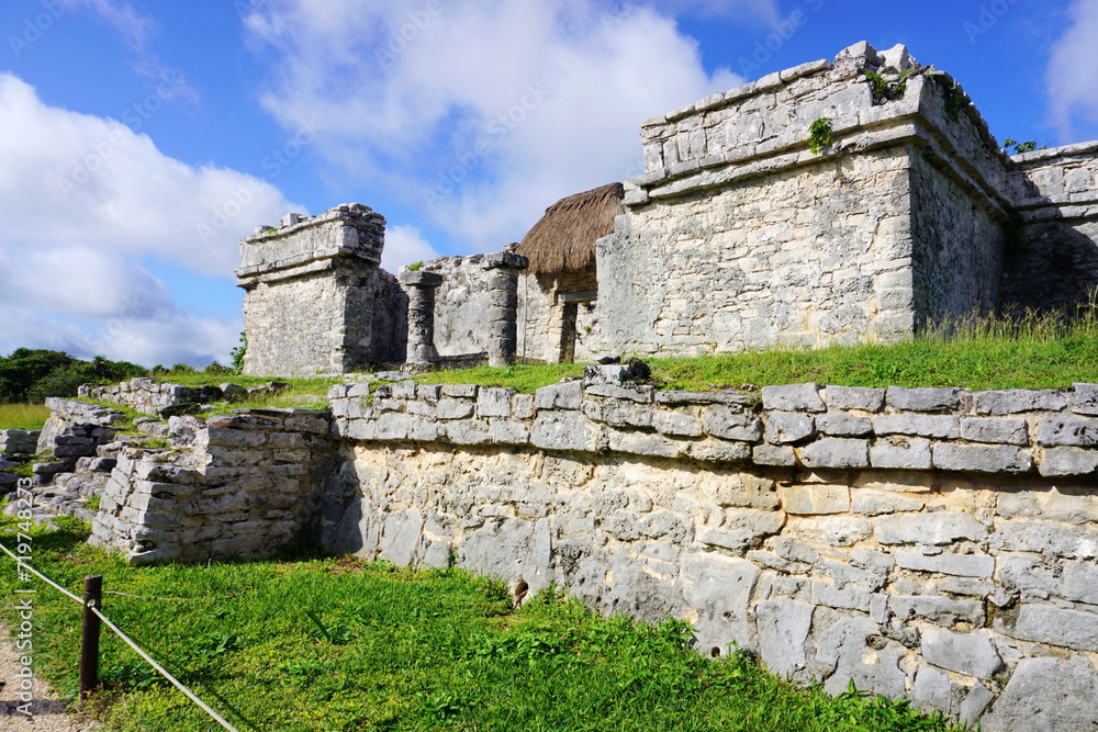 Tulum, Quintana Roo, Mexico - December 15, 2023: One side view of The Great Palace ruins at Tulum, The Maya City of the Dawning Sun.