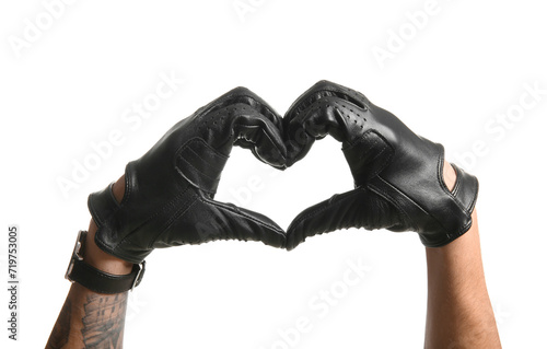 Man in black leather gloves making heart with his hands on white background, closeup