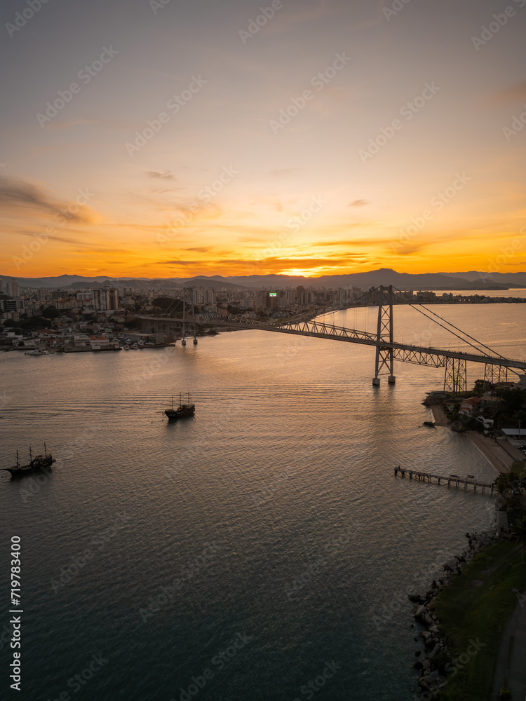 beautiful sunset on the Hercílio Luz bridge, in Florianópolis, Santa Catarina. Overlooking the mainland of the city