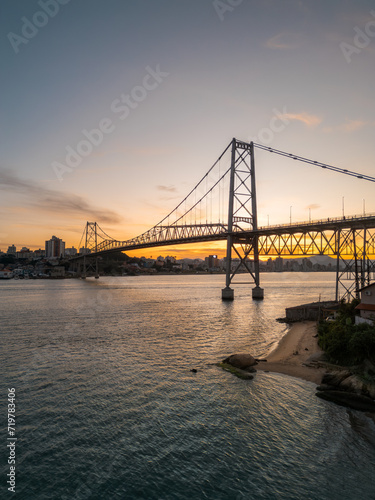 beautiful sunset on the Hercílio Luz bridge, in Florianópolis, Santa Catarina. Overlooking the mainland of the city