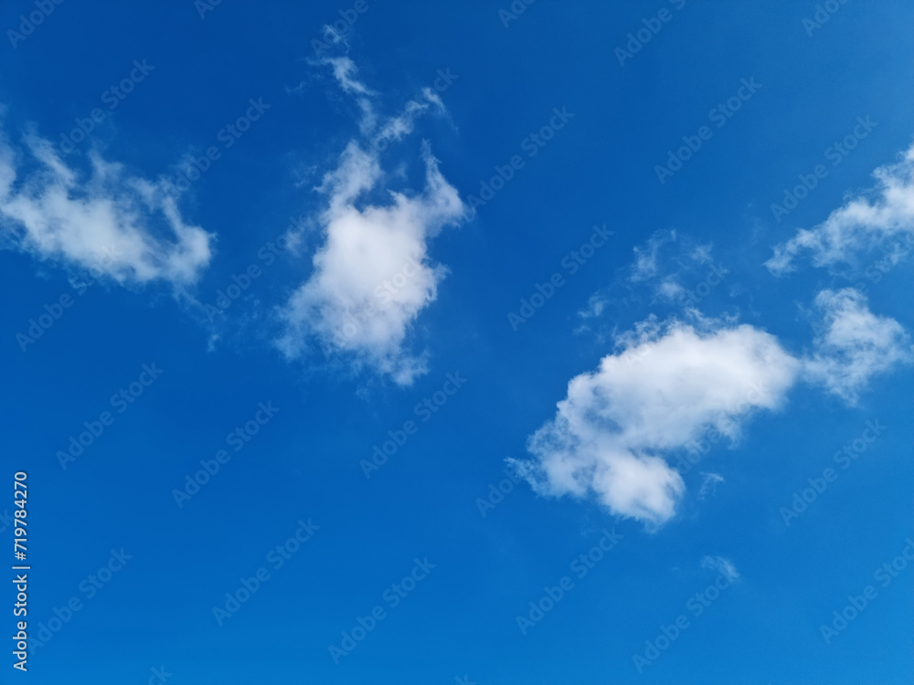 
Clear blue sky and clouds.