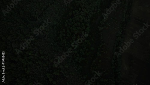 Aerial tilt shot revealing the smoking Popocatepetl volcano, vibrant dusk in Mexico photo