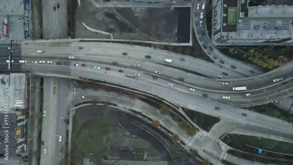 Complex freeway on and off ramp exchange in downtown urban city center metropolis merges and connects the network Complex freeway on and off ramp exchange in downtown urban city center metropolis merges and connects the network