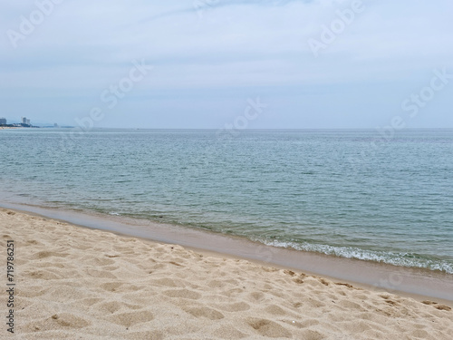 Soft beautiful ocean wave on sandy beach. Beach landscape.