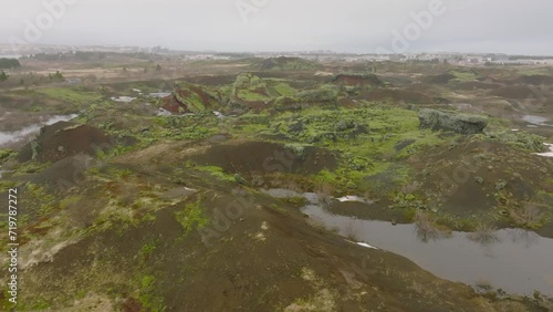 Aerial view of Raudholar craters, the Red Hills, geological formations of volcanic rocks, near Reykjavik, in Iceland photo