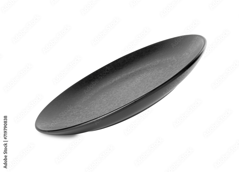 One beautiful black plate isolated on white One beautiful black plate isolated on white