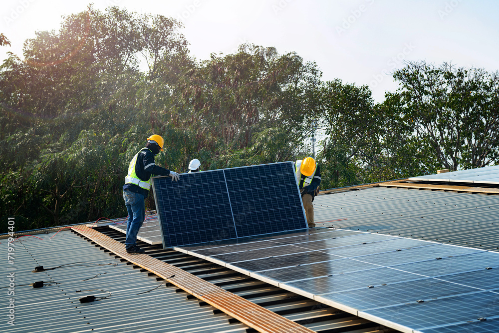 custom made wallpaper toronto digitalWorker Technicians are working to construct solar panels system on roof. Installing solar photovoltaic panel system. Men technicians carrying photovoltaic solar modules on roof.