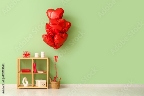 Red heart shaped balloons a...