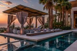 Luxury poolside lounge area at sunset