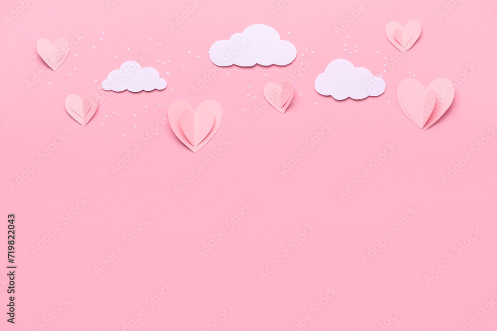 Composition with paper decor for Valentine's Day celebration on pink background