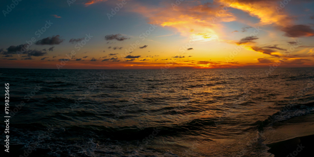 Coastal panoramic landscape. Ocean at dusk