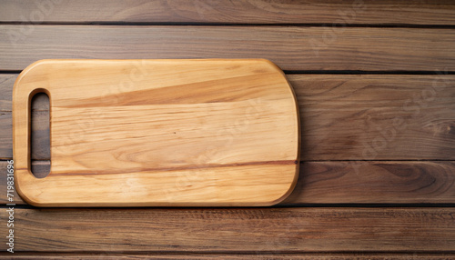 Culinary essentials: Cooking wooden board on wood table table. Flat lay with copy space