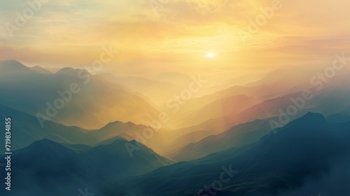 Golden sunrise illuminating the misty mountains. photo