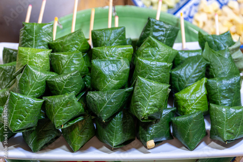 Miang Kham, Thai food appetizer , Savoury Leaf Wraps. photo