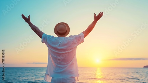 Back view of happy excited man raising arms up to blue sky - Hipster winner traveler enjoying summer sunset at the beach - Travel, mental health, success, business, tourism and life st : Generative AI