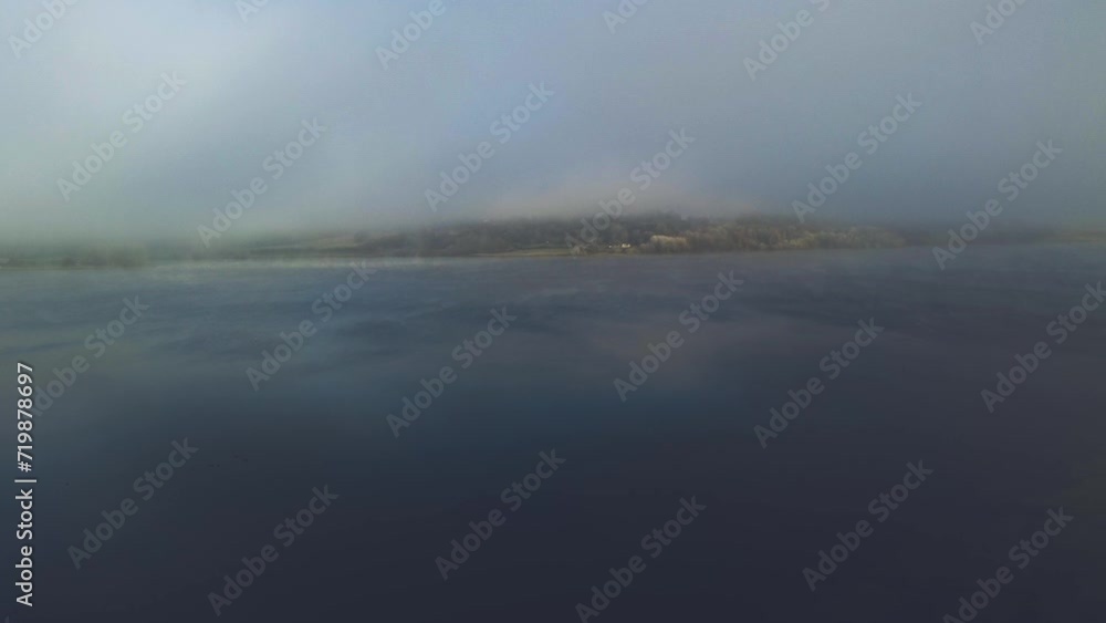 Aerial view 4k birds eye view of Rutland water in Rutland England UK. Clear blue skies on a cold day with clear waters and water fowl. Aerial view 4k birds eye view of Rutland water in Rutland England UK. Clear blue skies on a cold day with clear waters and water fowl.