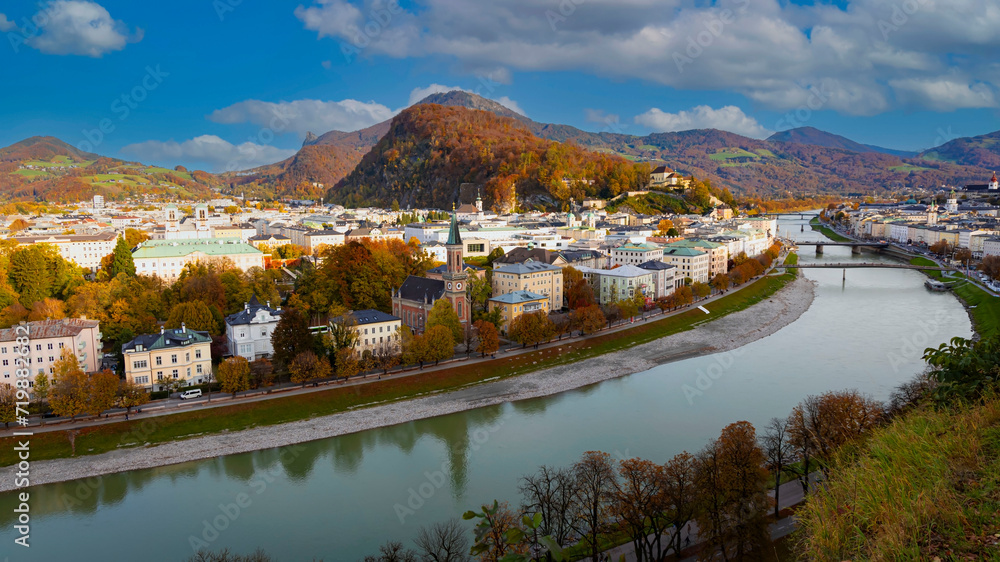 Autumn season at a historic city of Salzburg with Salzach river in beautiful sunset sky and colorful of autumn scene Salzburger Land, Austria