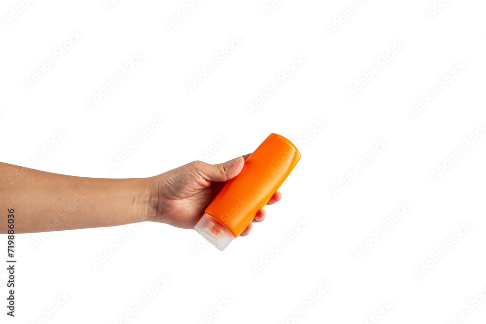 Shampoo bottle in hand isolated on transparent background Shampoo bottle in hand isolated on transparent background