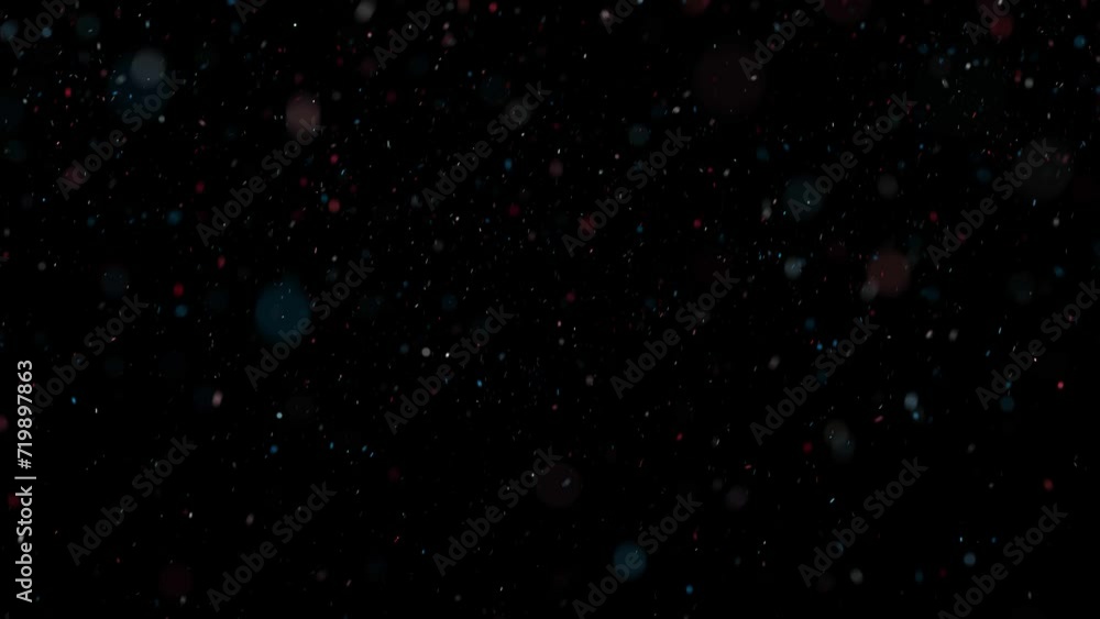 Seamless loop red blue white glitter particles fly animation on black background. Seamless loop red blue white glitter particles fly animation on black background.