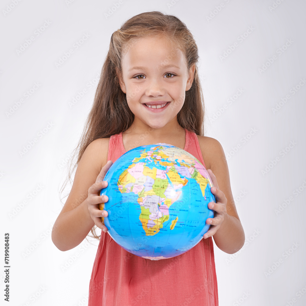 Child, portrait and globe in studio with world, planets and city for education, geography and happy. Student, girl kid and travel map with smile for earth day support or lesson on white background Child, portrait and globe in studio with world, planets and city for education, geography and happy. Student, girl kid and travel map with smile for earth day support or lesson on white background
