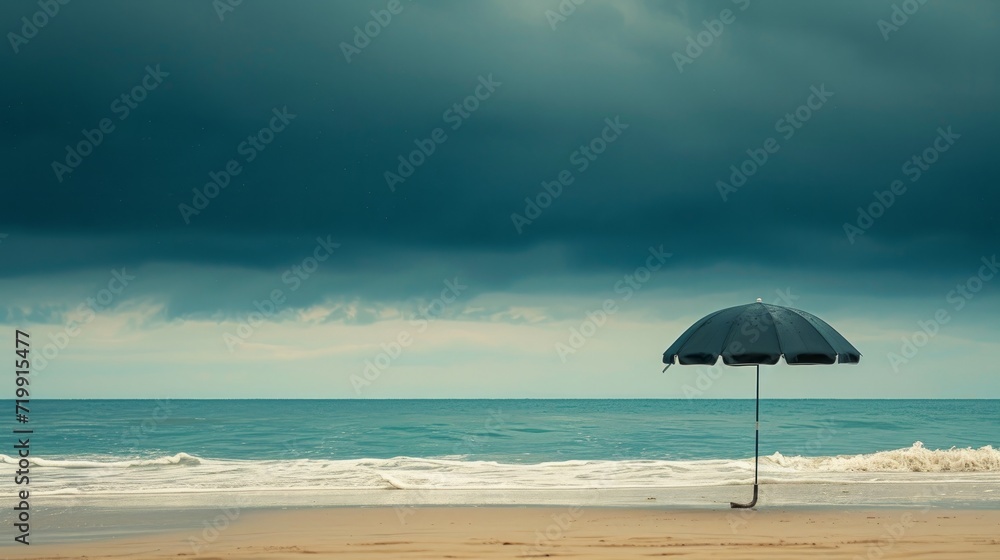 sinister umbrella at the beach   