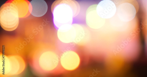 Vibrant Bokeh abstract blurred background music festival stage show performance party. Colorful bokeh background spark animate motion. Backdrop display with twinkling night life shape blinking light