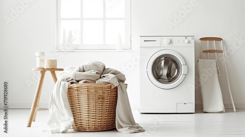 Laundry room with washing machine and laundry basket. Minimalist design photo