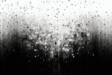 A black and white photo capturing a rain shower. Suitable for various applications