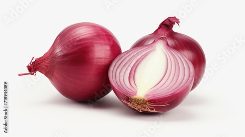A red onion and a slice of onion placed on a white surface. Perfect for cooking and food-related projects