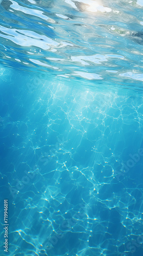 Underwater view of a swimming pool with ripples and blue water