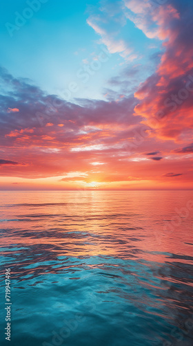 Beautiful sunset on the sea. Colorful sky with clouds.