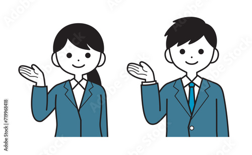 案内するスーツ姿の女性と男性