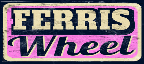 Vintage Ferris wheel sign on wood