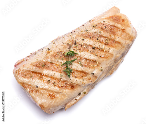 grilled cooked piece of tuna fillet isolated on white background