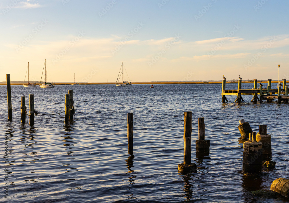 Sail Boats and Pier on The Amelia River at Sunset, Fernandina City, Amelia Island, Florida, USA