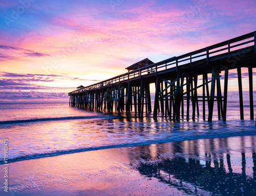 Sunrise and Wooden Pier on Fernandina Beach, Amelia Island, Florida, USA